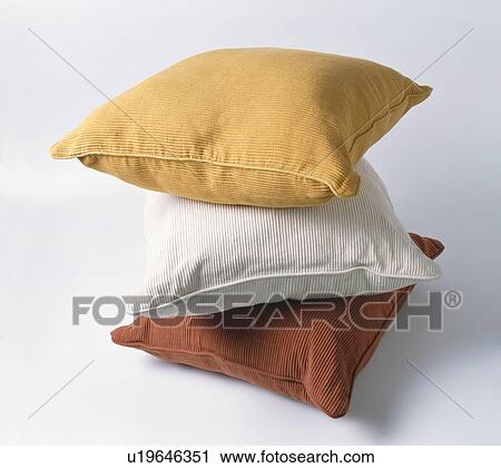 Close-up of three yellow, beige and red corduroy cushions View Large Photo Image Stock Image - Close-up of three yellow, beige and red corduroy cushions. Fotosearch