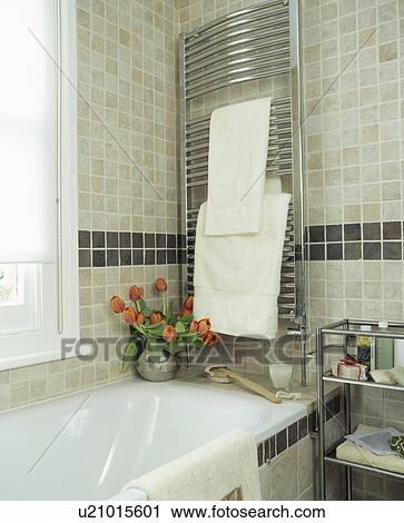 Close-up of towels on stainless steel radiator above bath View Large Photo Image Stock Image - Close-up of towels on stainless steel radiator above bath. Fotosearch