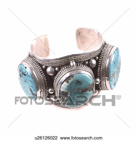 Stock Image - Close-up of turquoise and silver bracelet. Fotosearch