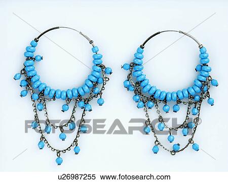 Close-up of turquoise beaded earrings View Large Photo Image Stock Photography - Close-up of turquoise beaded earrings. Fotosearch