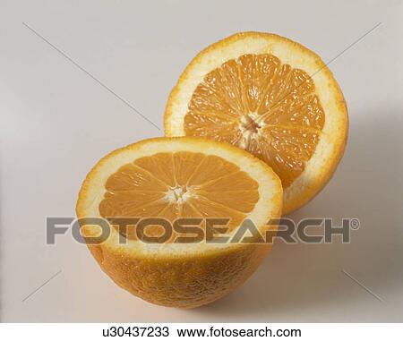 Close-up of two halves of an orange View Large Photo Image Stock Image - Close-up of two halves of an orange. Fotosearch