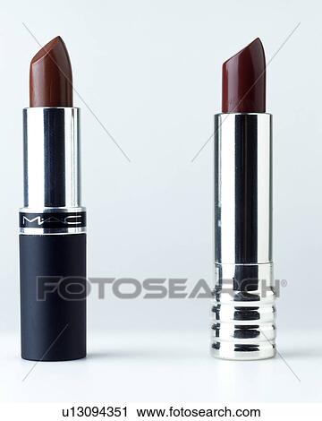 Stock Image - Close-up of two Mac lipsticks. Fotosearch