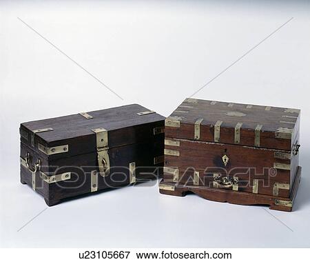 Close-up of two small brass-bound wooden boxes View Large Photo Image Stock Photo - Close-up of two small brass-bound wooden boxes. Fotosearch
