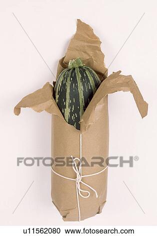 Close-up of vegetable marrow wrapped in brown paper and tied with string View Large Photo Image Stock Image - Close-up of vegetable marrow wrapped in brown paper and tied with string. Fotosearch