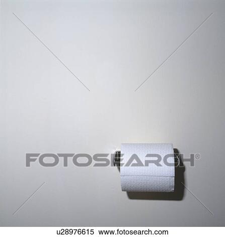 Close-up of wall-mounted roll of white toilet paper View Large Photo Image Stock Photography - Close-up of wall-mounted roll of white toilet paper. Fotosearch