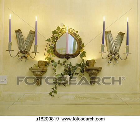 Close-up of wall-sconces with lighted candles View Large Photo Image Stock Photo - Close-up of wall-sconces with lighted candles. Fotosearch