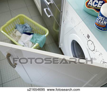 Stock Photography - Close-up of washing machine. Fotosearch