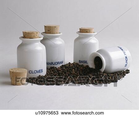 Close-up of white ceramic spice jars View Large Photo Image Stock Image - Close-up of white ceramic spice jars. Fotosearch