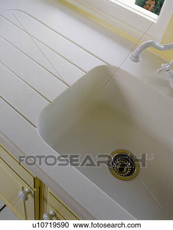 Close-up of white Corian sink and draining-board View Large Photo Image Stock Image - Close-up of white Corian sink and draining-board. Fotosearch