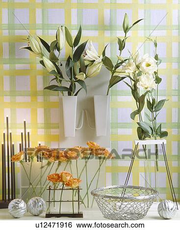 Close-up of white lilies and orange roses in modern vases and holders View Large Photo Image Stock Photograph - Close-up of white lilies and orange roses in modern vases and holders. Fotosearch