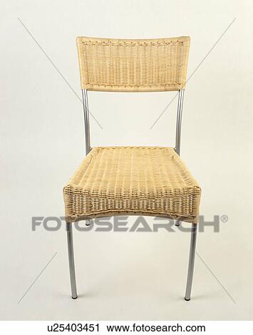 Close-up of wicker and steel dining chair View Large Photo Image Stock Image - Close-up of wicker and steel dining chair. Fotosearch