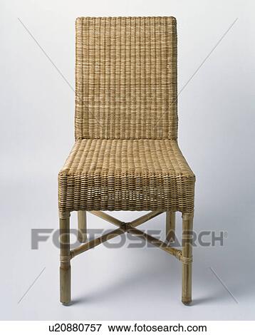 Close-up of wicker dining-chair View Large Photo Image Stock Photo - Close-up of wicker dining-chair. Fotosearch