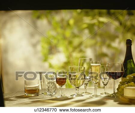Close-up of wine glasses with red and white wine View Large Photo Image Stock Image - Close-up of wine glasses with red and white wine. Fotosearch