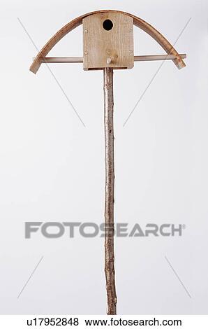Close-up of wooden bird-box on hazel pole View Large Photo Image Stock Photo - Close-up of wooden bird-box on hazel pole. Fotosearch