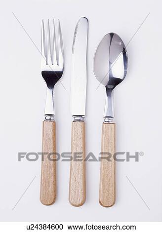 Close-up of wooden-handled knife and fork with spoon View Large Photo Image Stock Image - Close-up of wooden-handled knife and fork with spoon. Fotosearch