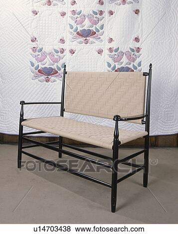 Close-up of wooden sofa with woven cream seat and back View Large Photo Image Stock Photo - Close-up of wooden sofa with woven cream seat and back. Fotosearch