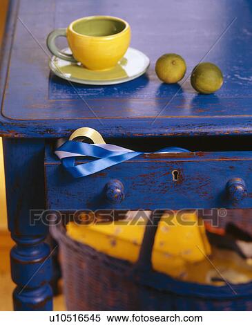 Close-up of yellow and green pottery cup on blue painted table View Large Photo Image Stock Photography - Close-up of yellow and green pottery cup on blue painted table. Fotosearch