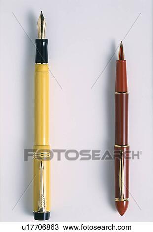 Close-up of yellow fountain pen with red ballpoint pen View Large Photo Image Stock Image - Close-up of yellow fountain pen with red ballpoint pen. Fotosearch