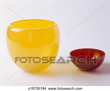 Close Up Of Yellow Glass Bowl Vase With Red Glass Bowl Picture