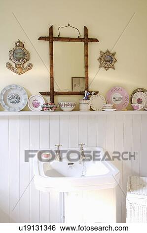 Closeup of white pedestal bathroom basin with white painted vertical board behind, a collection of china and bamboo mirror. View Large Photo Image Stock Photograph - Closeup of white pedestal bathroom basin with white painted vertical board behind, a collection of china and bamboo mirror.. Fotosearch