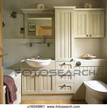 Contemporary bathroom with fitted cupboards View Large Photo Image Stock Image - Contemporary bathroom with fitted cupboards. Fotosearch