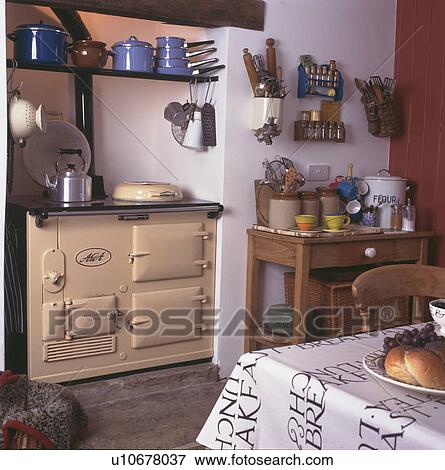 Cream Aga oven in white cottage kitchen View Large Photo Image Stock Photo - Cream Aga oven in white cottage kitchen. Fotosearch