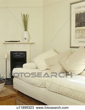 Cream sofa in cream country living room View Large Photo Image Stock Image - Cream sofa in cream country living room. Fotosearch