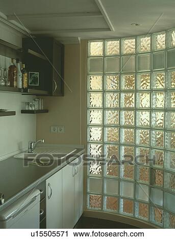 Curved glass brick wall in modern white kitchen View Large Photo Image Stock Image - Curved glass brick wall in modern white kitchen. Fotosearch
