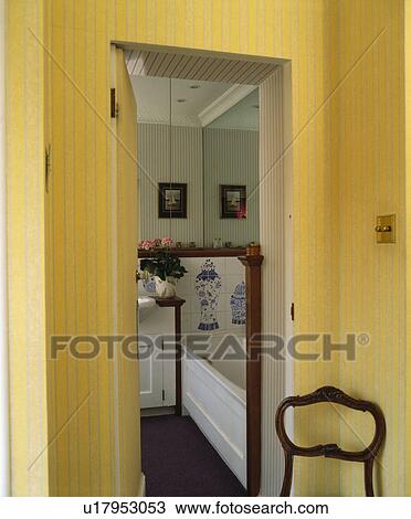 Door open to small townhouse bathroom View Large Photo Image Stock Image - Door open to small townhouse bathroom. Fotosearch