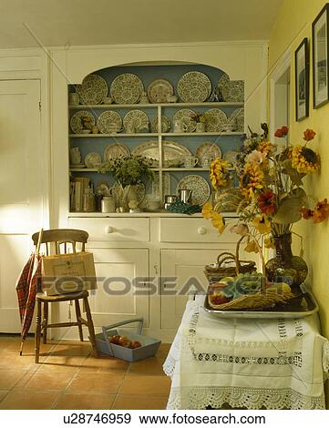 Fitted cream dresser in country kitchen View Large Photo Image Stock Photo - Fitted cream dresser in country kitchen. Fotosearch