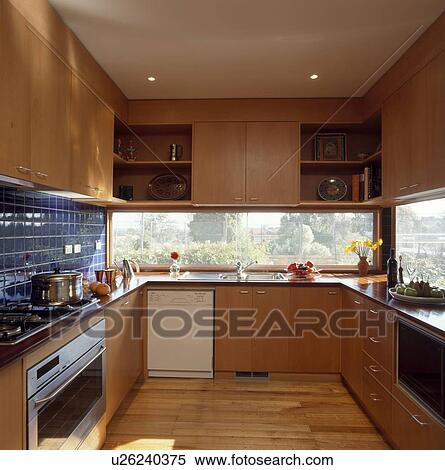 Fitted wood units in modern kitchen View Large Photo Image Stock Photography - Fitted wood units in modern kitchen . Fotosearch