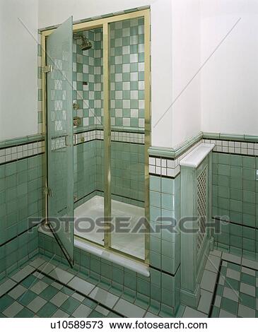 Glass doors on shower cabinet in blue and white bathroom View Large Photo Image Stock Image - Glass doors on shower cabinet in blue and white bathroom . Fotosearch