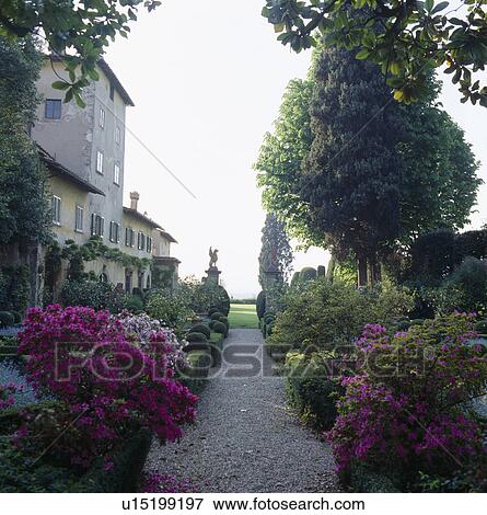 Gravel path through with pink azaleas in formal garden of Italian country villa View Large Photo Image Stock Photo - Gravel path through with pink azaleas in formal garden of Italian country villa. Fotosearch