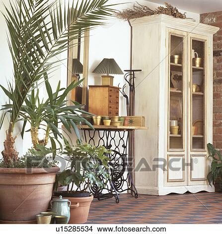 Green houseplants in traditional hall View Large Photo Image Picture - Green houseplants in traditional hall. Fotosearch