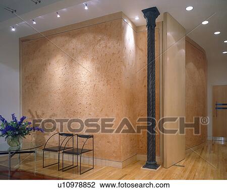 Halogen ceiling lights in modern loft conversion hall with black chairs and textured wall View Large Photo Image Stock Image - Halogen ceiling lights in modern loft conversion hall with black chairs and textured wall. Fotosearch