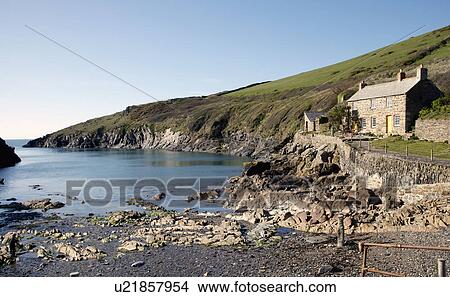 Isolated cottages on Cornish beach at lowtide. View Large Photo Image Picture - Isolated cottages on Cornish beach at lowtide.. Fotosearch