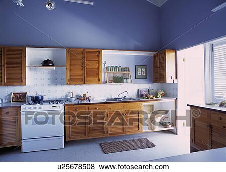 Kitchen with Blue Walls. View Large Photo Image Stock Photo - Kitchen with Blue Walls.. Fotosearch