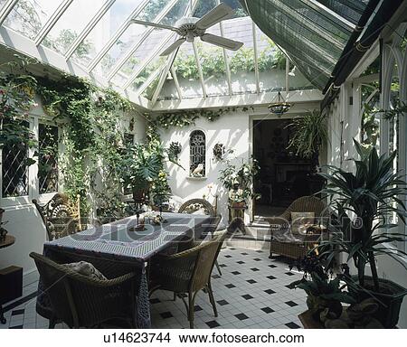 Large traditional conservatory dining room with ceramic flooring View Large Photo Image Picture - Large traditional conservatory dining room with ceramic flooring. Fotosearch