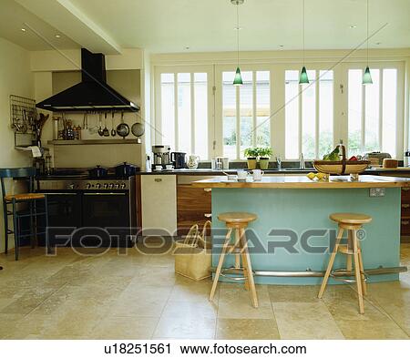 limestone flooring in large modern kitchen with turquoise island unit View Large Photo Image Stock Image - limestone flooring in large modern kitchen with turquoise island unit. Fotosearch
