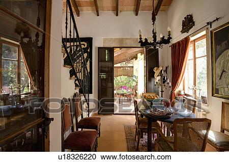 Mediterranean dining room with view of the terrace View Large Photo Image Stock Image - Mediterranean dining room with view of the terrace. Fotosearch