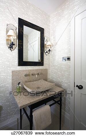 Mirror above beige granite basin on granite vanity unit View Large Photo Image Stock Photo - Mirror above beige granite basin on granite vanity unit. Fotosearch