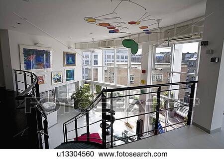 Mobile in large modern open-plan loft conversion apartment View Large Photo Image Stock Image - Mobile in large modern open-plan loft conversion apartment. Fotosearch