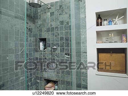 Open shelves beside shower with limestone tiles View Large Photo Image Stock Image - Open shelves beside shower with limestone tiles. Fotosearch