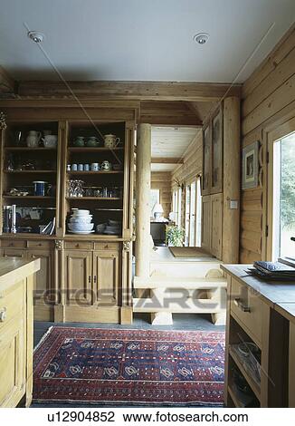 Oriental rug on floor of country kitchen View Large Photo Image Stock Image - Oriental rug on floor of country kitchen. Fotosearch