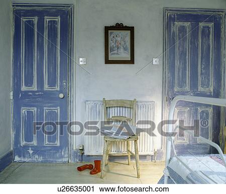 Painted blue+white doors in tradtiional bedroom View Large Photo Image Stock Image - Painted blue+white doors in tradtiional bedroom. Fotosearch