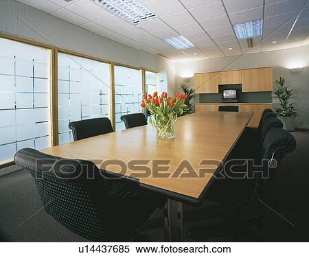 Pale wood table in boardroom in modern office View Large Photo Image Stock Photography - Pale wood table in boardroom in modern office. Fotosearch