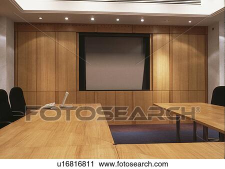 Pale wood tables in meeting room in modern office View Large Photo Image Stock Image - Pale wood tables in meeting room in modern office. Fotosearch