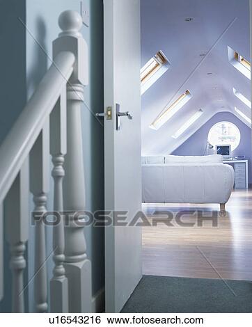 Pastel blue home office in loft conversion View Large Photo Image Stock Photograph - Pastel blue home office in loft conversion. Fotosearch