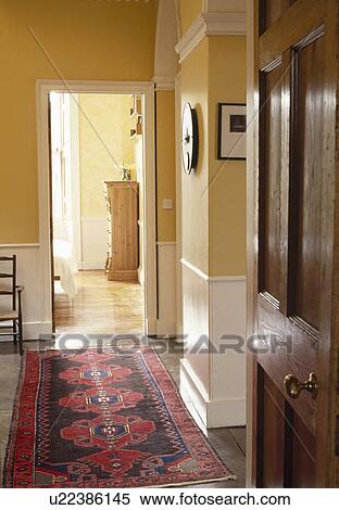 Stock Photography - Patterned carpet in traditional hall. Fotosearch