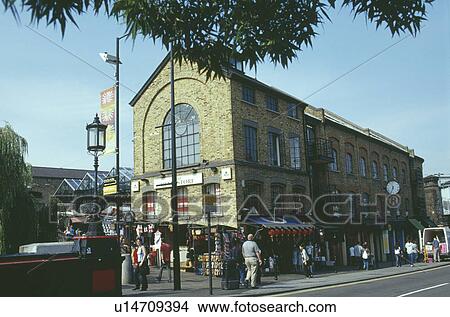 Picture - People on the street outside Camden Market in North London. Fotosearch